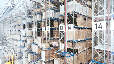 Pallet rack with cartons on euro pallets