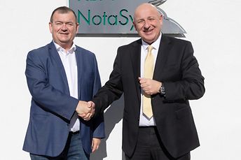 Koenig & Bauer and SSI SCHAEFER handshake concerning order intake