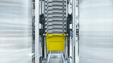 Orders worden volautomatisch gepikt door een systeem die de orders vervoert via een transportband