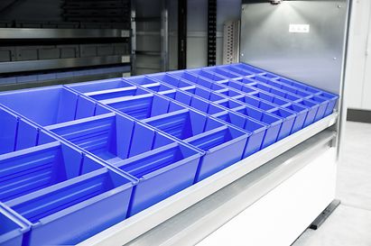 LMB containers on a tray for vertical lift module LogiMat®