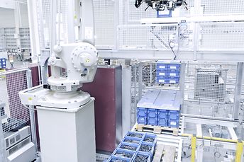 The robot is equipped with a special gripper finger system for transferring