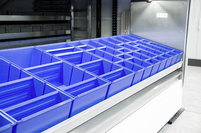 LMB containers on a tray for vertical lift module SSI LogiMat®