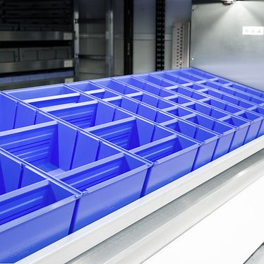 LMB containers on a tray for vertical lift module LogiMat®