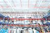 3-tier Mezzanine for garments in flat-packed boxes and on hangers